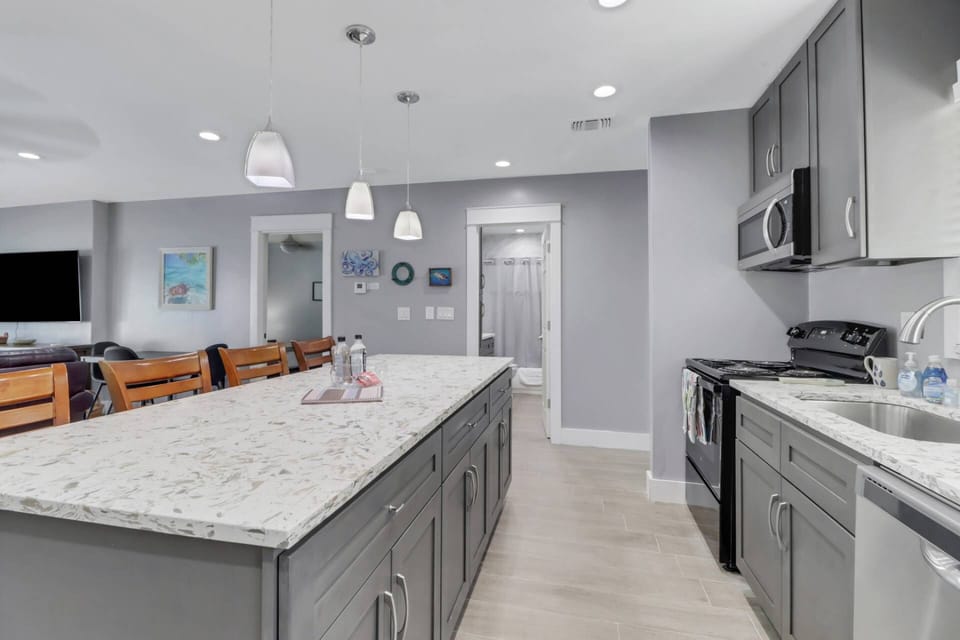 Cooking and serving meals will be a pleasure in this kitchen with all cookware, dishes, glasses, and silverware included.