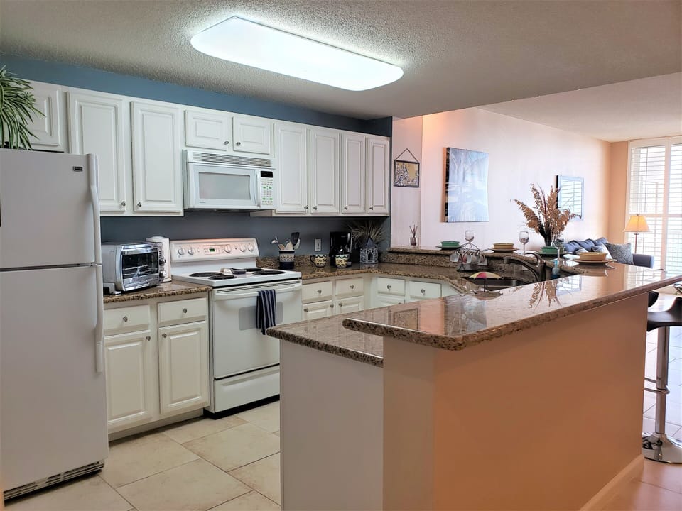 kitchen - open kitchen with granite and stocked with everything you'll need!