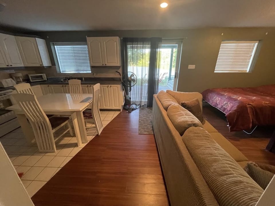 Bottom Floor - Kitchen, eating table and sleeping area. 