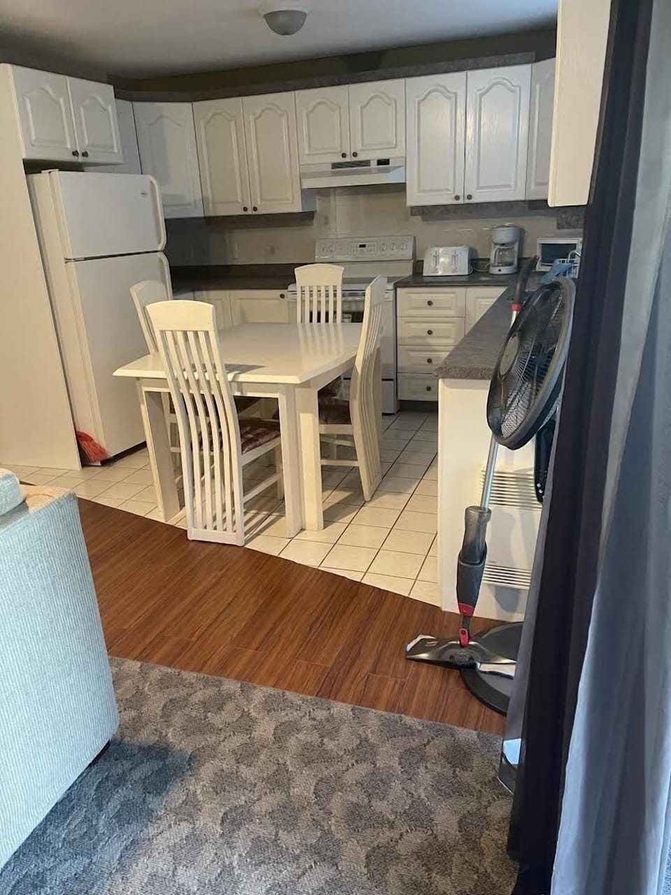 Bottom Floor - Full kitchen/eating area. Not fully equipped for cooking. 