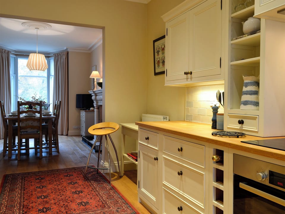 Well-equipped fitted kitchen with access to the dining room | Linton, Keswick