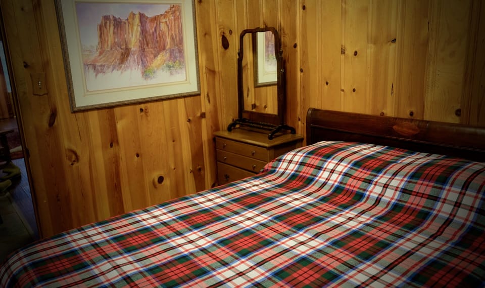 Full bed, first bedroom, two windows