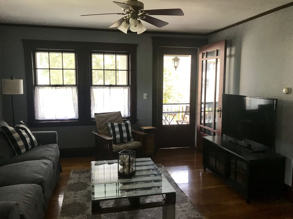 TV room opens onto the front porch. There is a wonderful cross breeze.