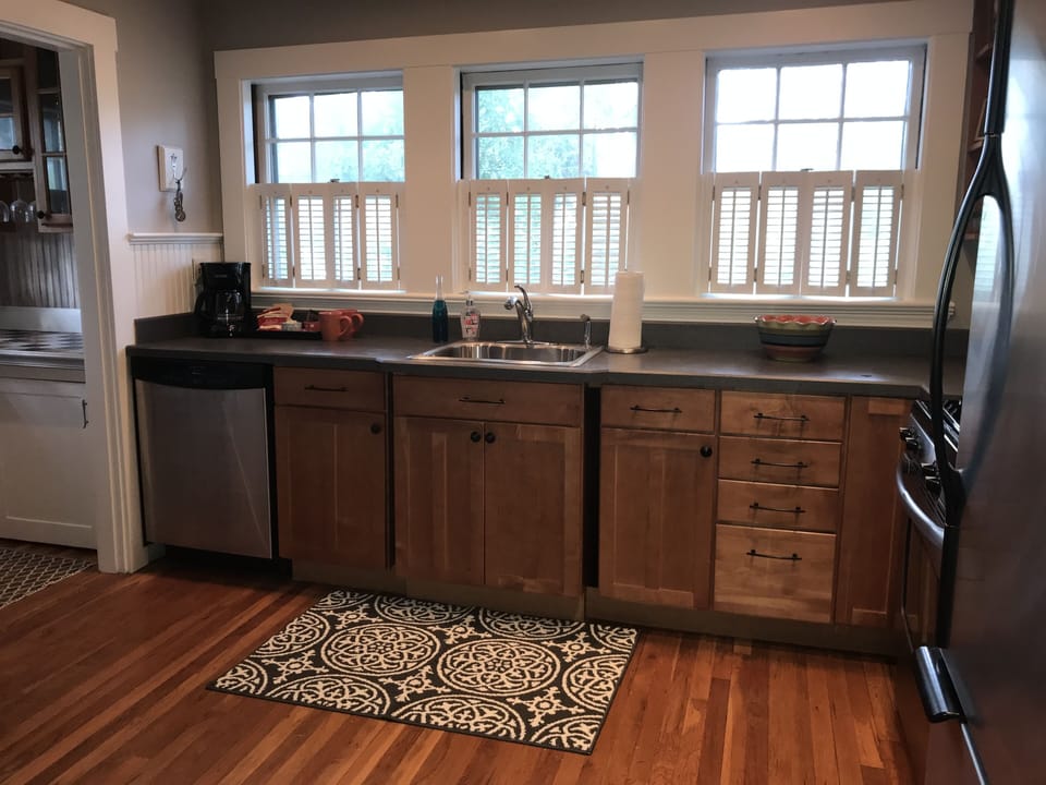 Fully stocked kitchen includes dishwasher  gas stove fridge disposal & microwave