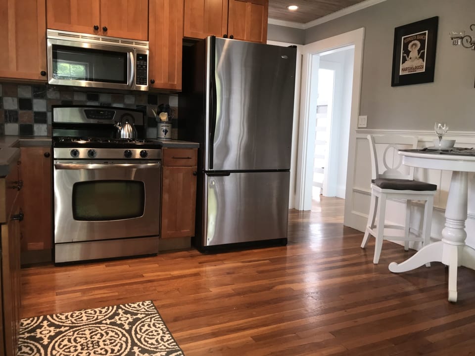 Fully stocked kitchen includes dishwasher  gas stove fridge disposal & microwave