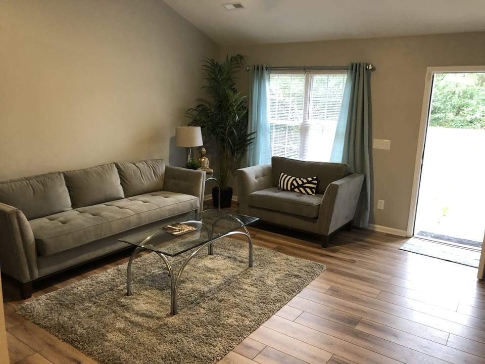 Living room is large and entertains easily.  Has a large TV and Alexa assistant