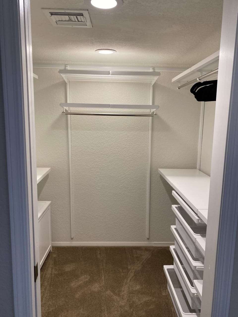 Walk-in closet in the primary bedroom