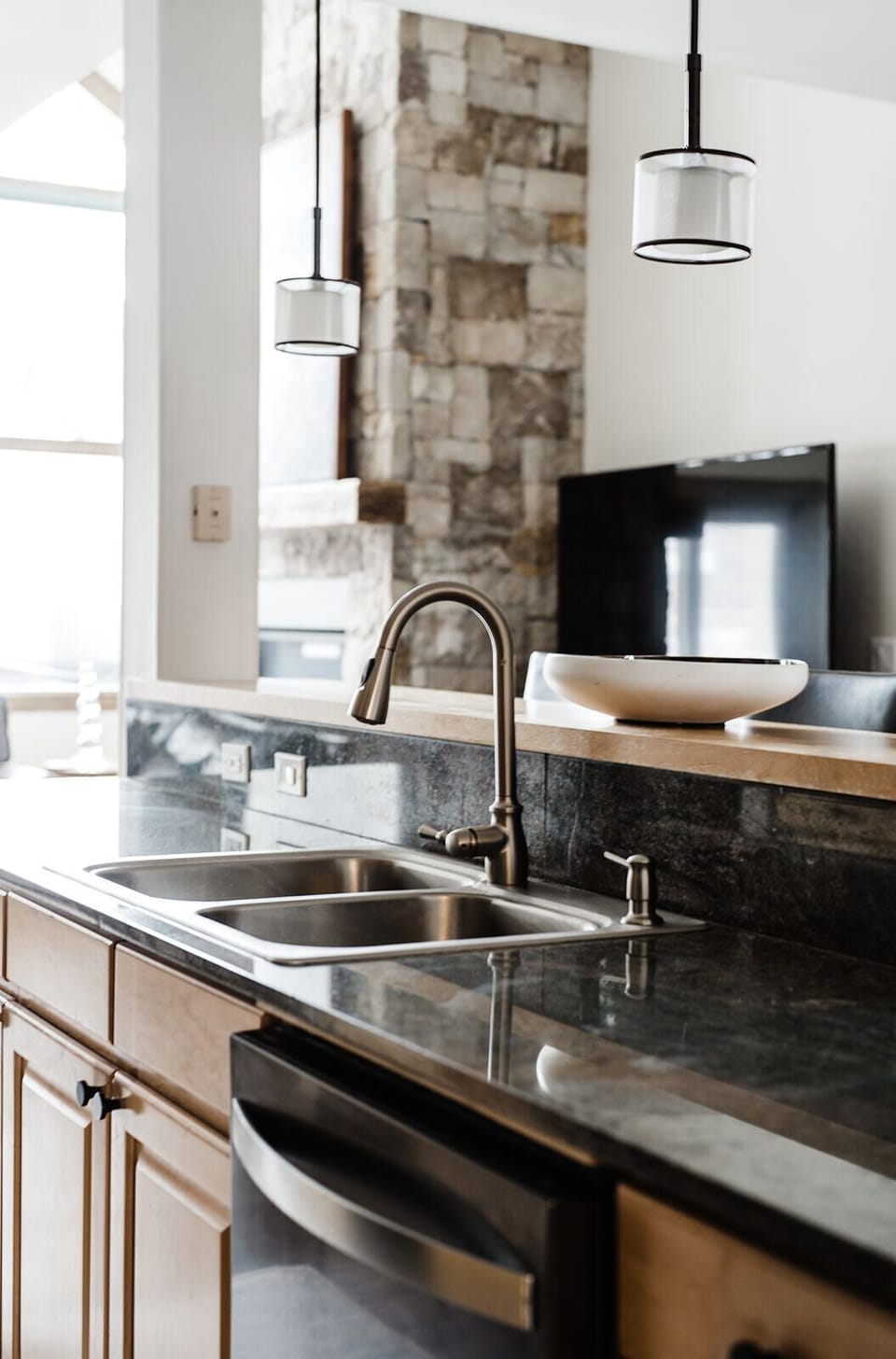 Kitchen has plenty of pots and pans, dishes and glasses for large groups
