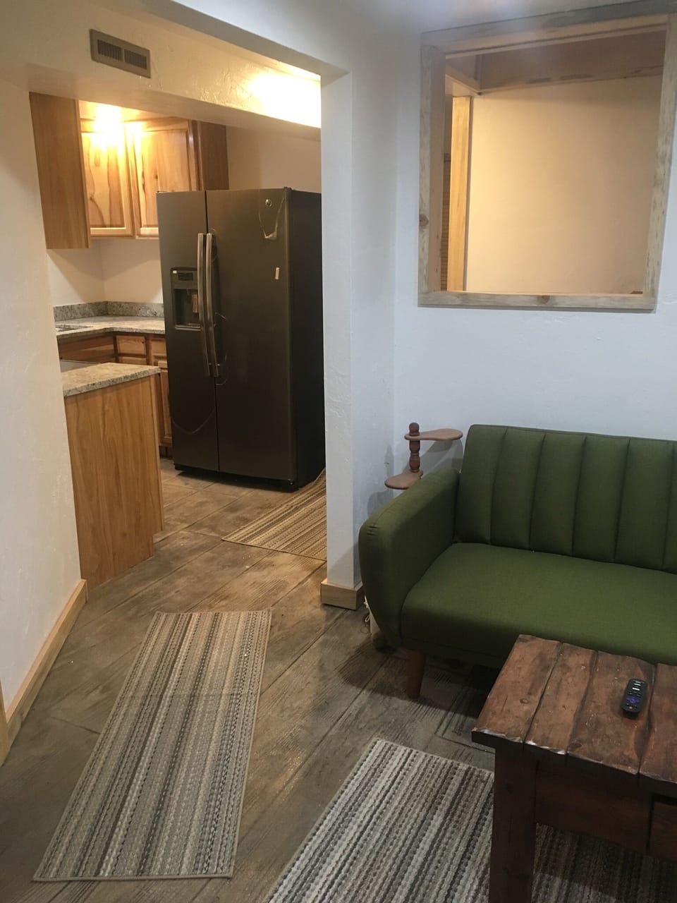 basement living room and kitchen