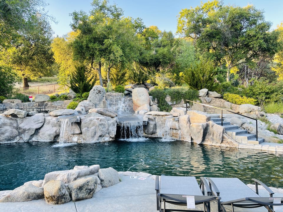 Resort Style Pebble Tech Pool with Cascading Waterfall & Heated Spa
