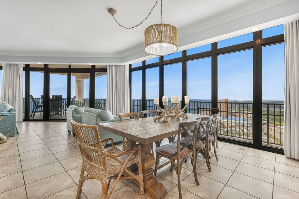 Large Dining Table for family dinner together with extra seating at kitchen bar