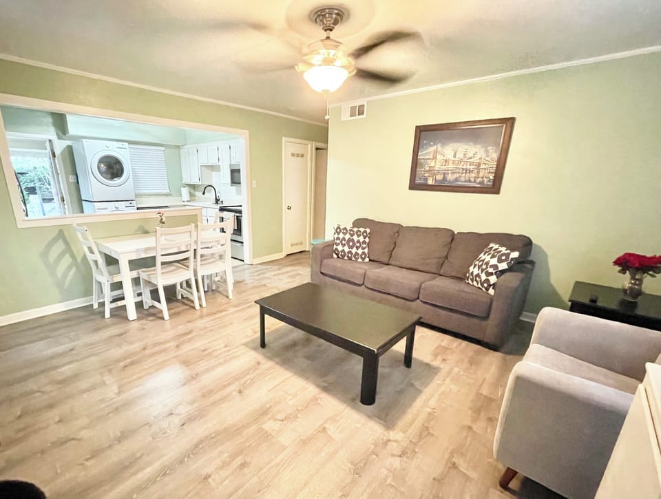 Our living room features modern super comfortable furniture and a ROKU 65” HDTV!