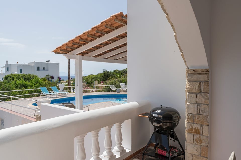 A gas BBQ on the balcony. 