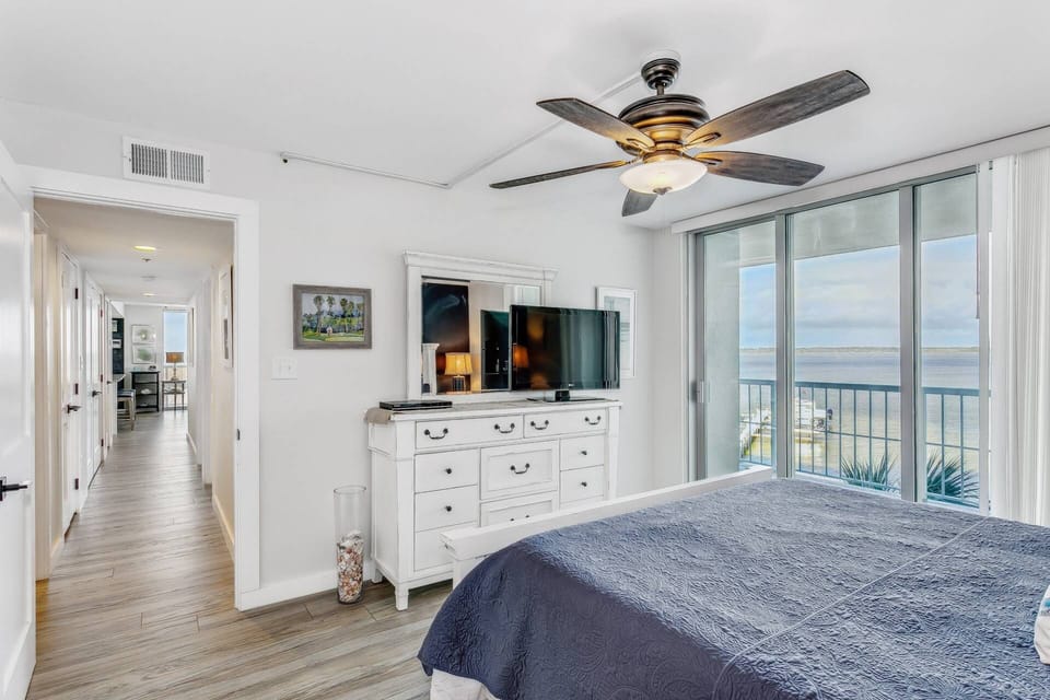King bed in the master suite with cable TV