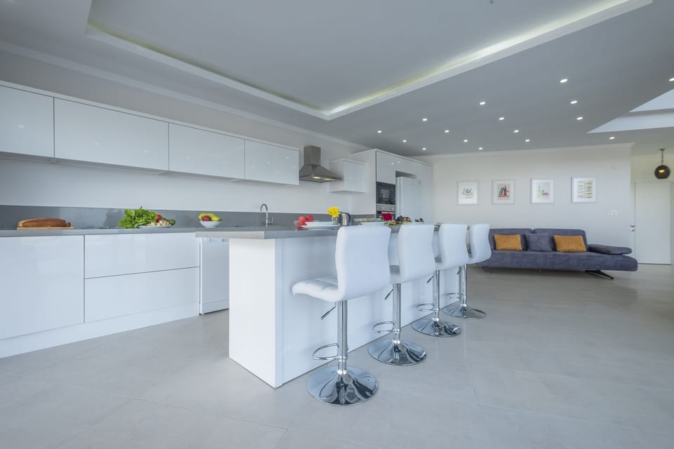 Kitchen with island and seating.