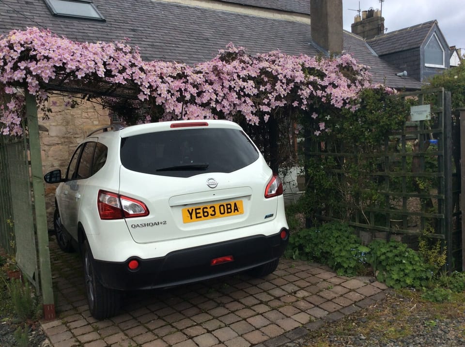 Private off road parking next to garden