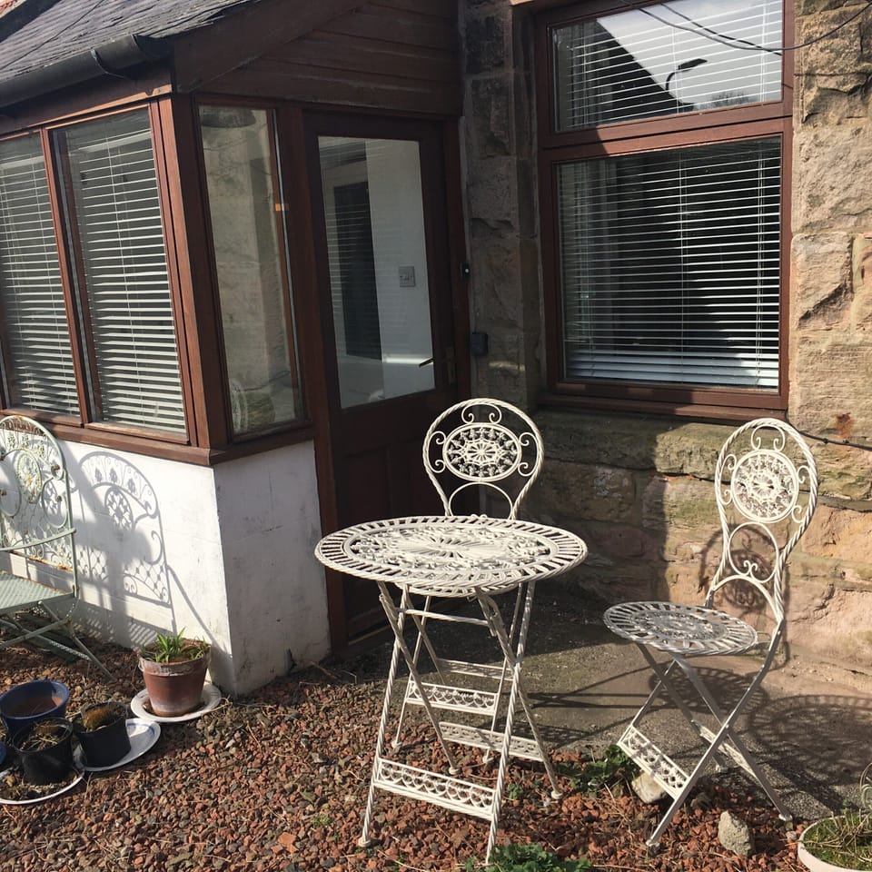 Entrance is from the garden into the studio flat