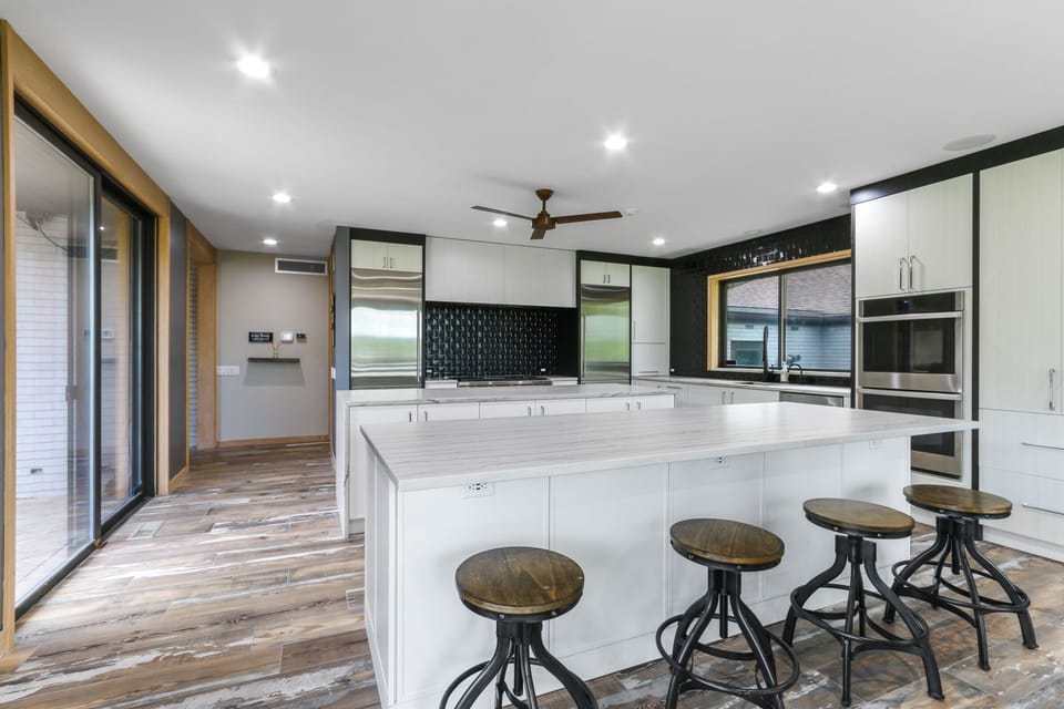 Professional Wolf kitchen to accomodate your next family dinner. Heated floor 