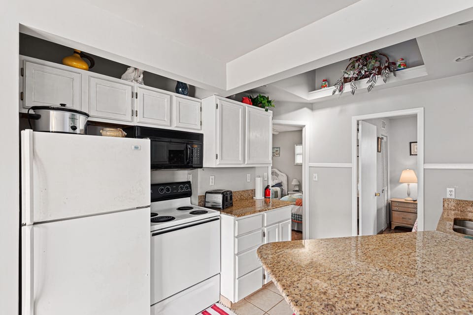 Full sized refrigerator and oven/stove