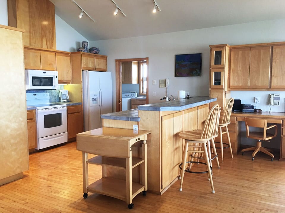 Kitchen  - additional seating at the bar.