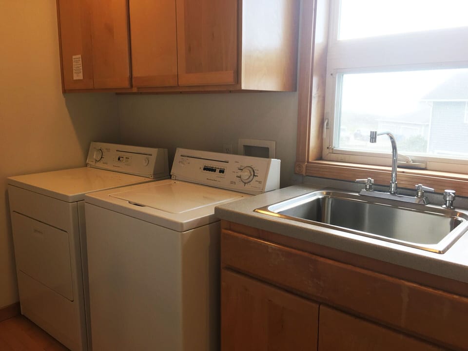 Washer and dryer - located upstairs.