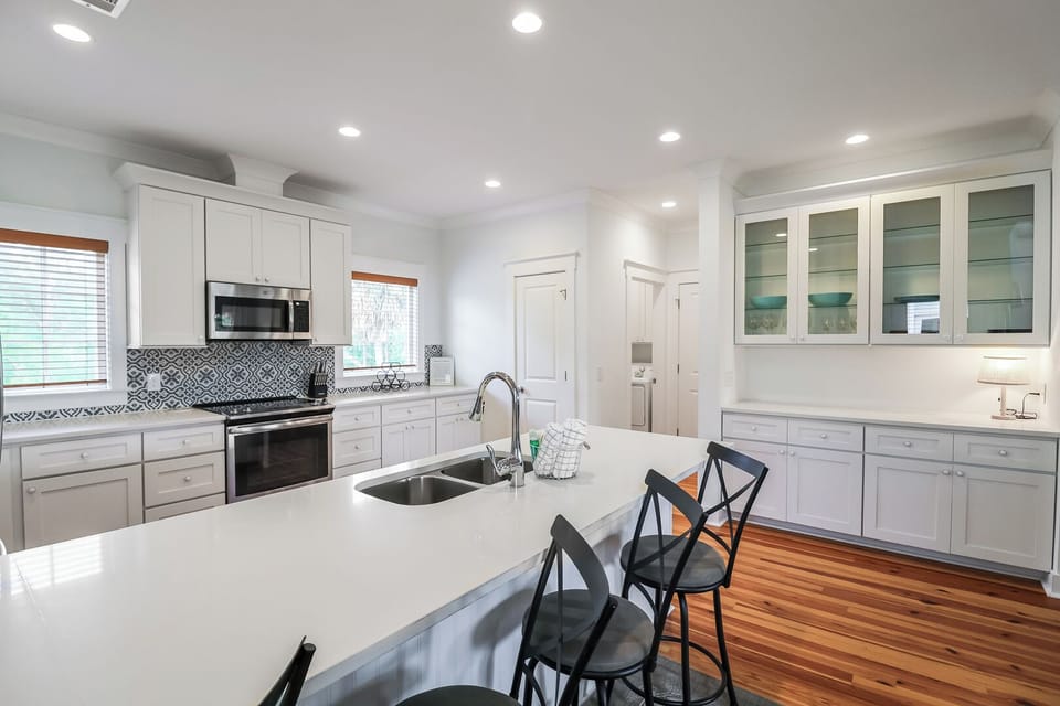 Large kitchen with stainless steel appliances perfect for cooking meals