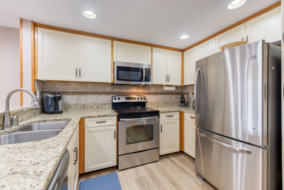 Kitchen w/ stainless steel appliances