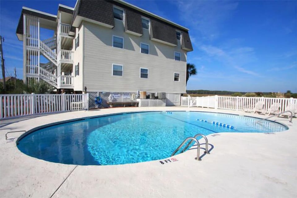 A refreshing dip in the pool feels great after a day in the sand and sun.