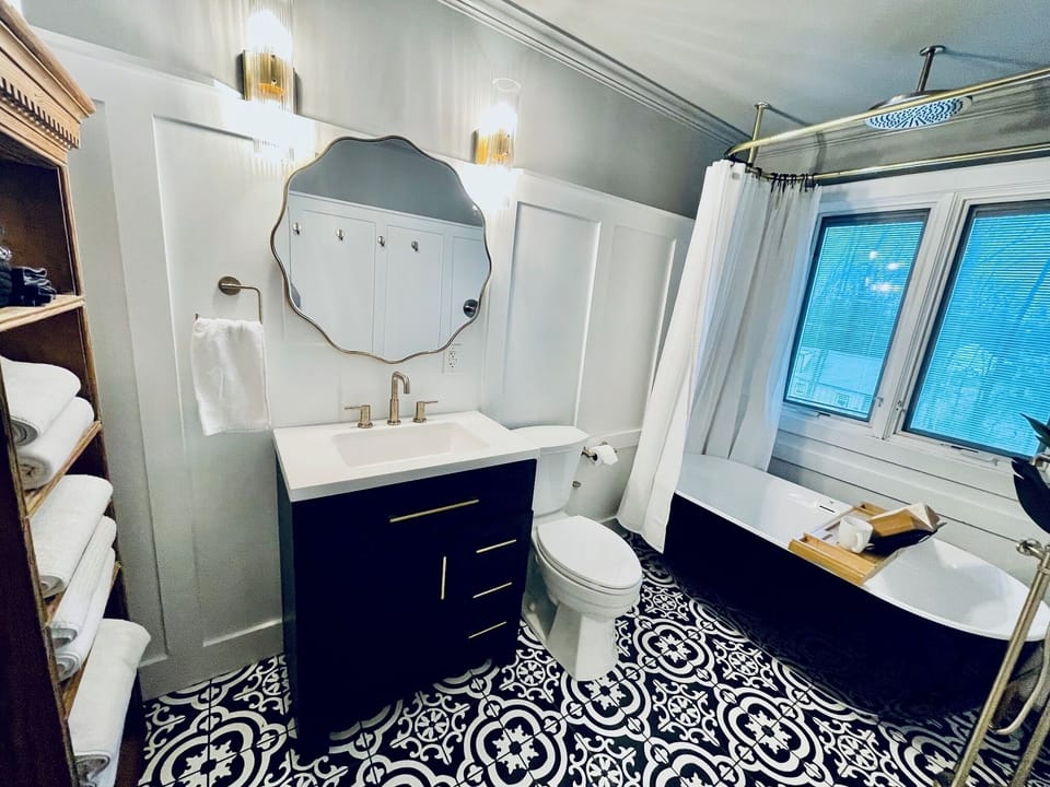 Bathroom located on main level for the top three bedrooms and living area.