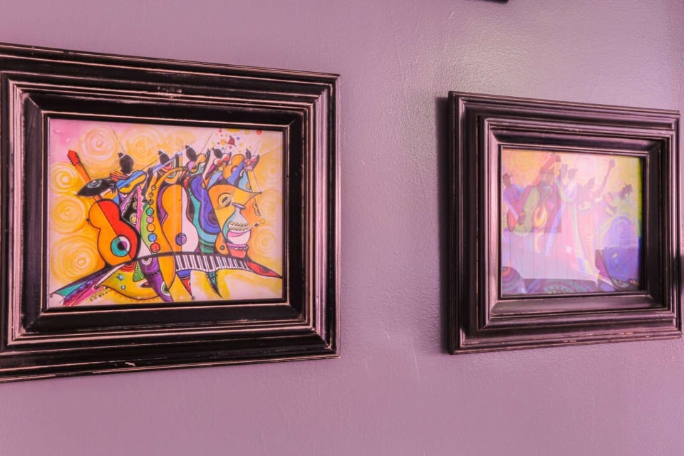 This home celebrates the historic entertainment & social gathering spots of Scanlonville.