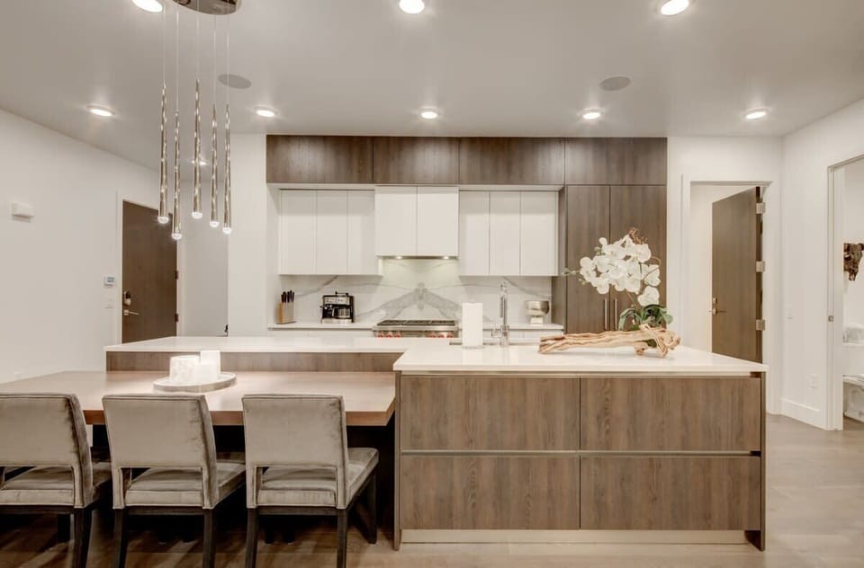 Kitchen with Wolf appliances and breakfast bar seating