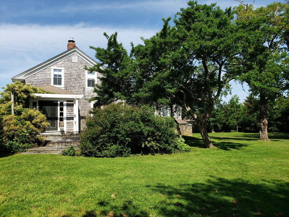 Backyard view of the home and porch.