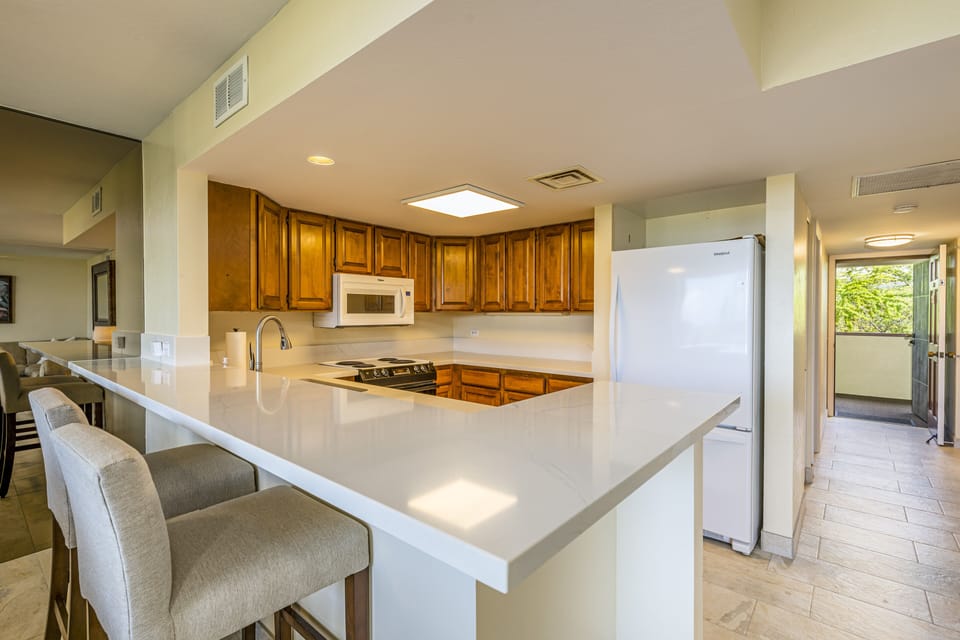 The kitchen is bright and functional for making meals