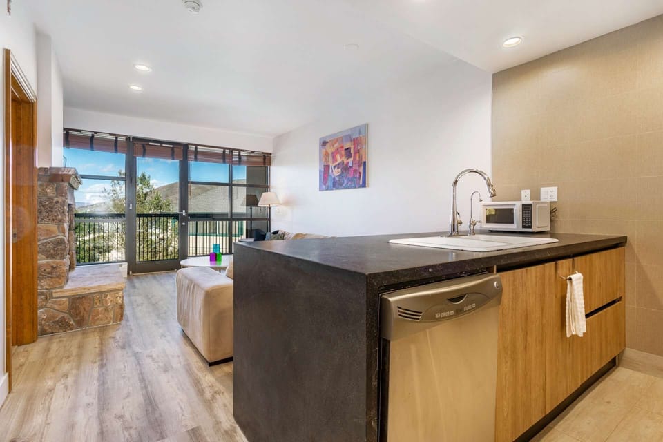 Enjoy the mountain views while whipping up a fabulous meal in the fully equipped kitchen.