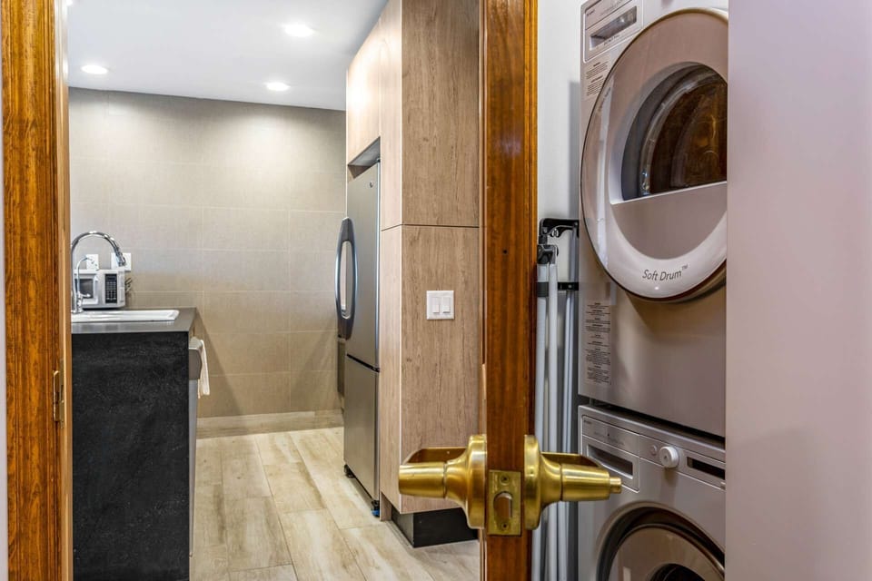 Washer and Dryer conveniently located in the condo for guests to use.