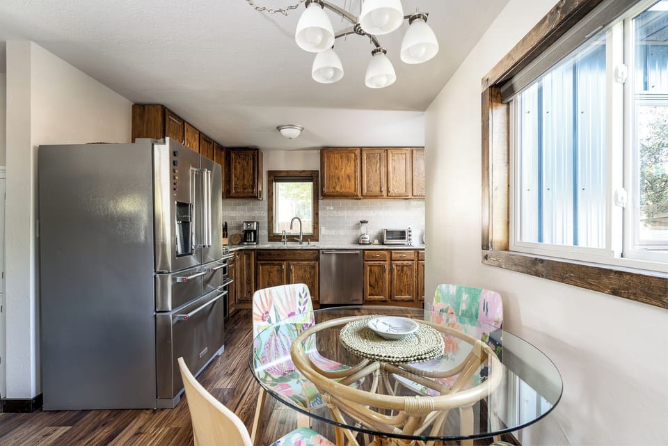 Dining table can sit 4 guests.