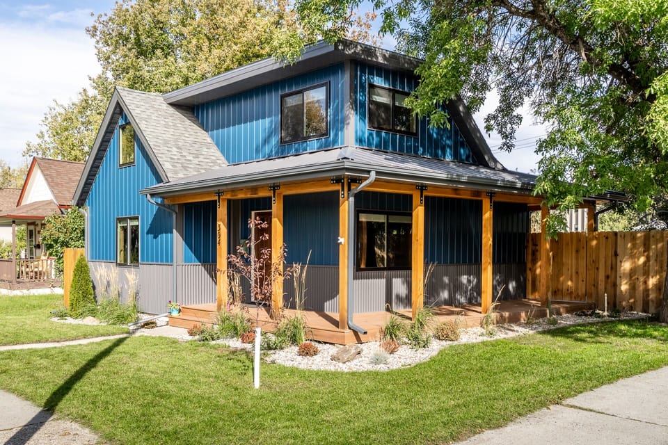 Small side porch and yard to enjoy.