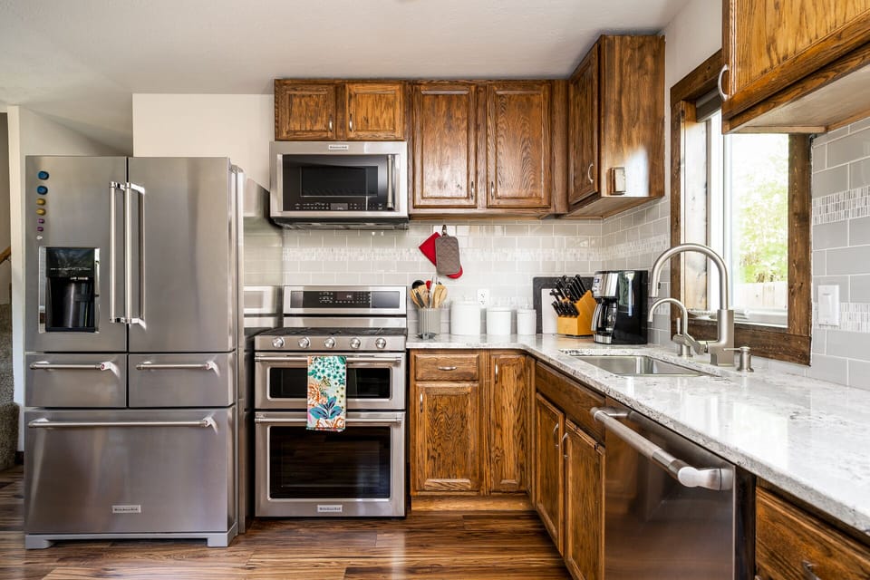 Full kitchen with drip coffee maker.