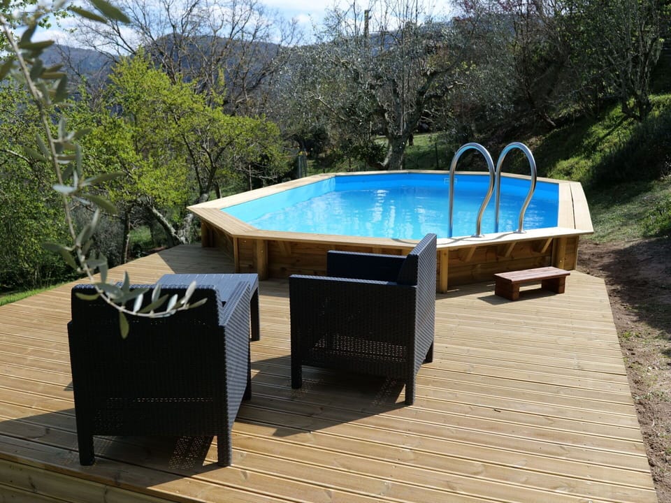Water, Swimming Pool, Outdoor Furniture, Shade, Rectangle, Wood, Composite Material, Tree, Leisure, Plant