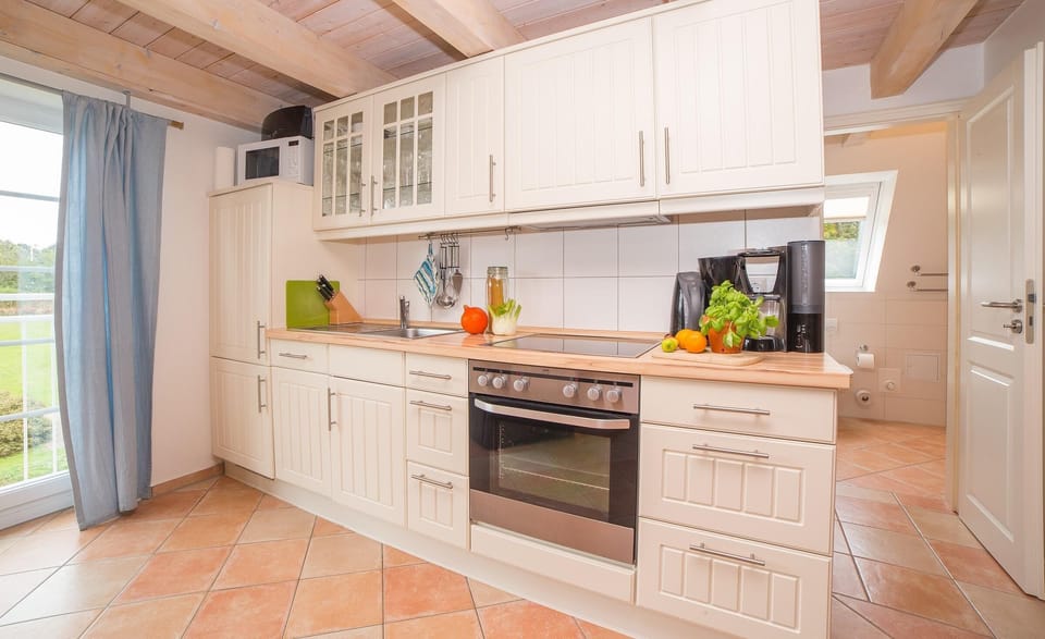 Kitchen & hall to bathroom and bedroom