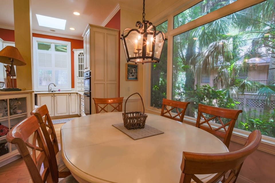 The kitchen table seats 6.