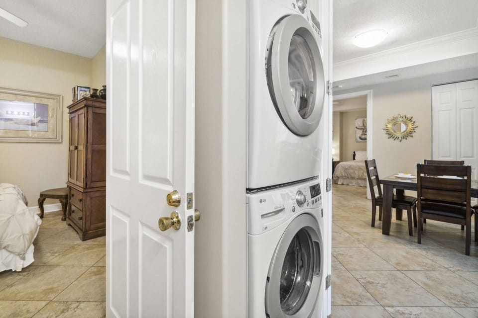 Laundry area with washing machine and dryer.