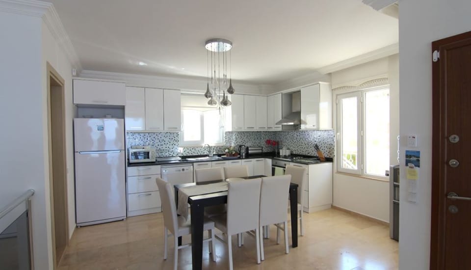 Open plan kitchen, with washroom to  the left