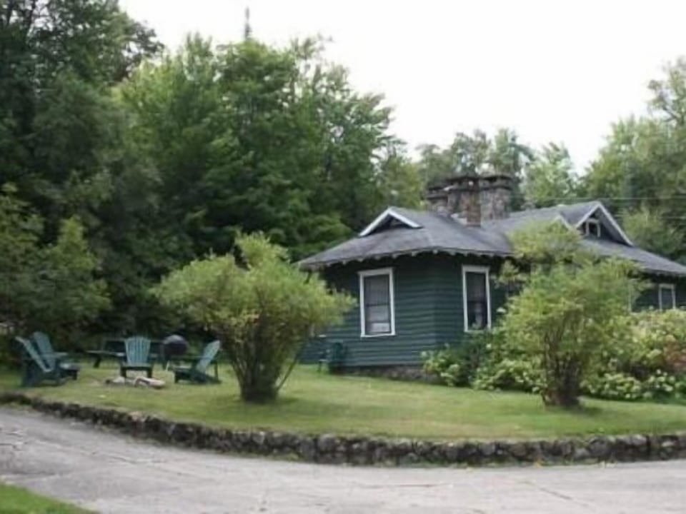This shows Gate's side yard where the fire pit and sitting area are located