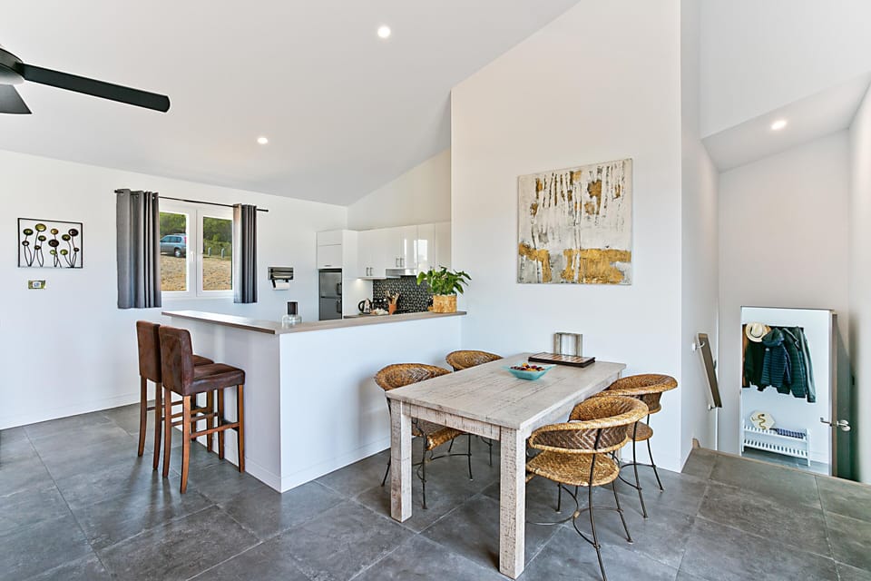The dining area is right next to the kitchen