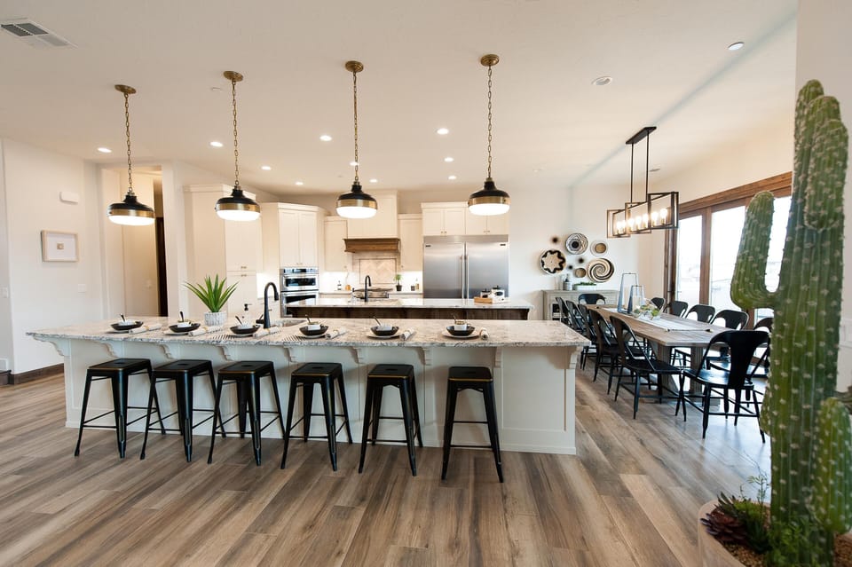 Grand kitchen includes 2 separate islands - each with sink and dishwasher