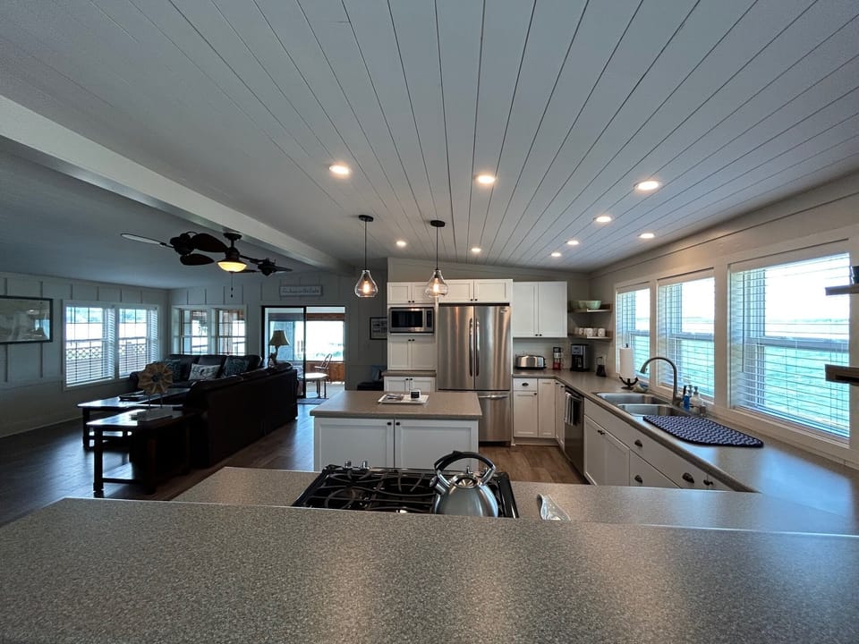 Kitchen - Kitchen with views of the open layout living room.