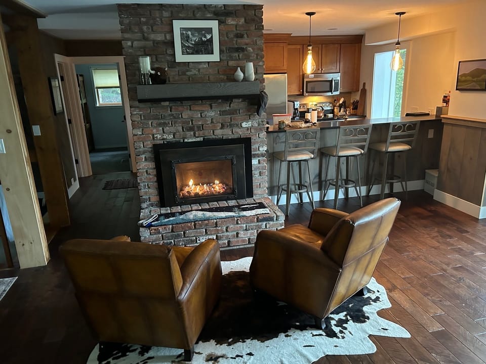 Sitting room looking into the kitchen.