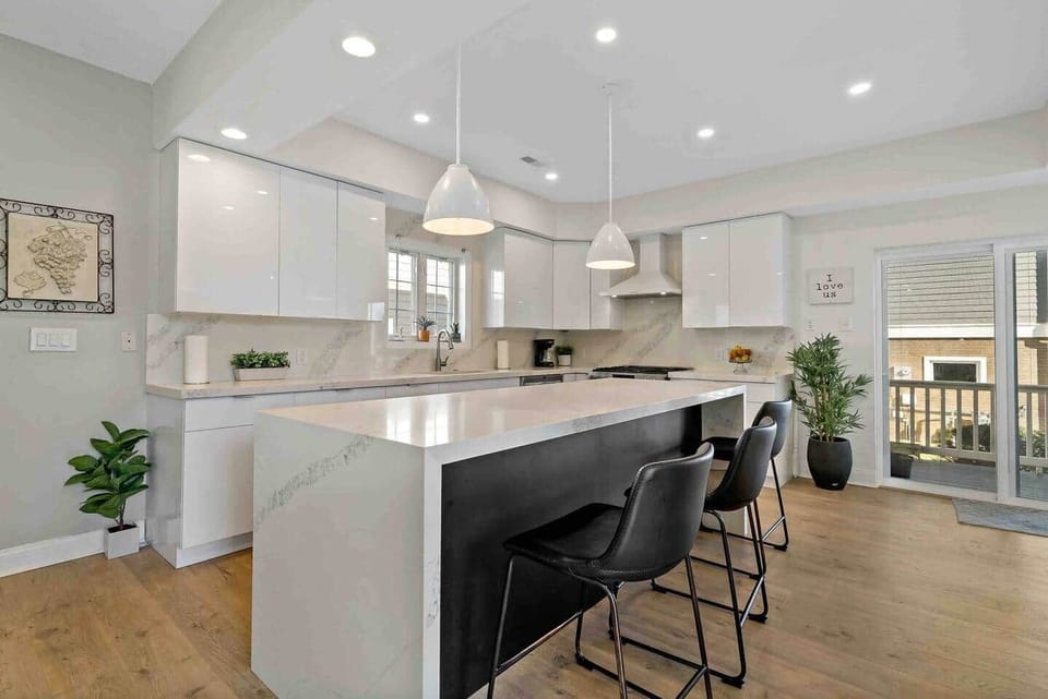 New kitchen-36 in refrigerator, dishwasher, microwave, stove,garbage disposal, Island . Sliding door leading to out side patio. Lots of countertop space for entertaining. Kitchen is fully equipped with all of your entertaining needs-pots, dishes. 