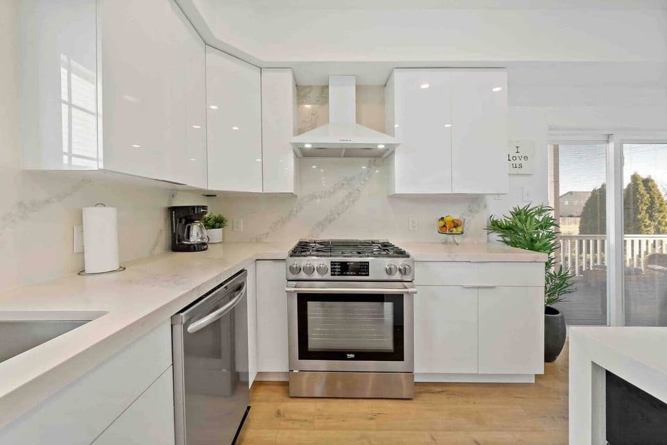 New kitchen-36 in refrigerator, dishwasher, microwave, stove,garbage disposal, Island . Sliding door leading to out side patio. Lots of countertop space for entertaining. Kitchen is fully equipped with all of your entertaining needs-pots, dishes. 